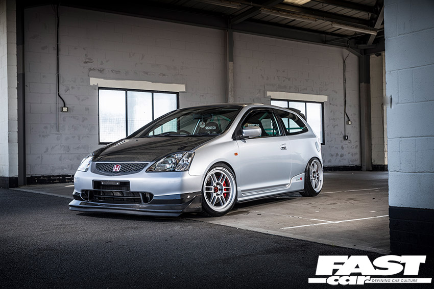 Head on shot of silver Honda Civic Type R EP3 with carbon fibre bonnet